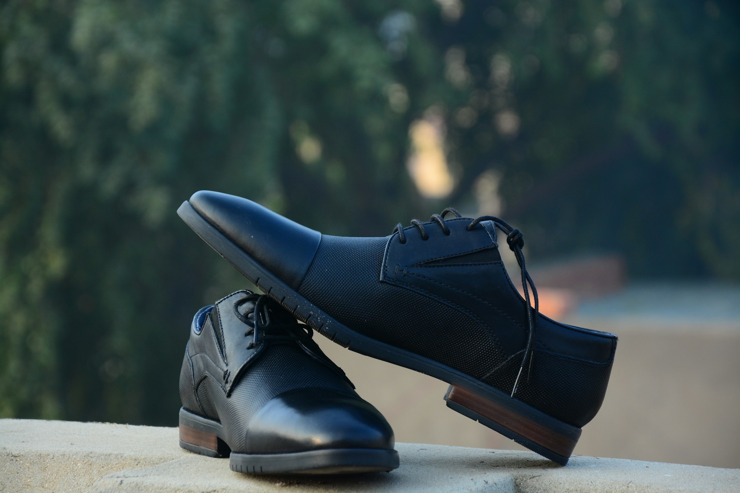 Black leather lace-up shoes